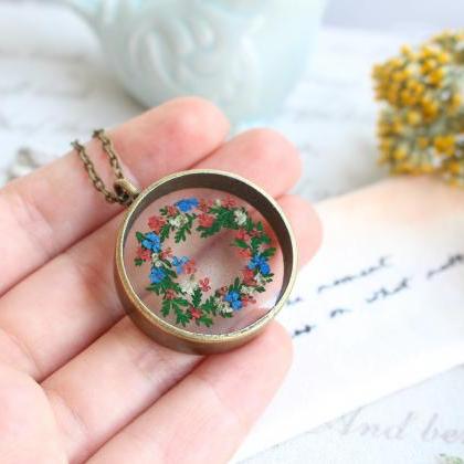 Unique necklace with pressed flower..